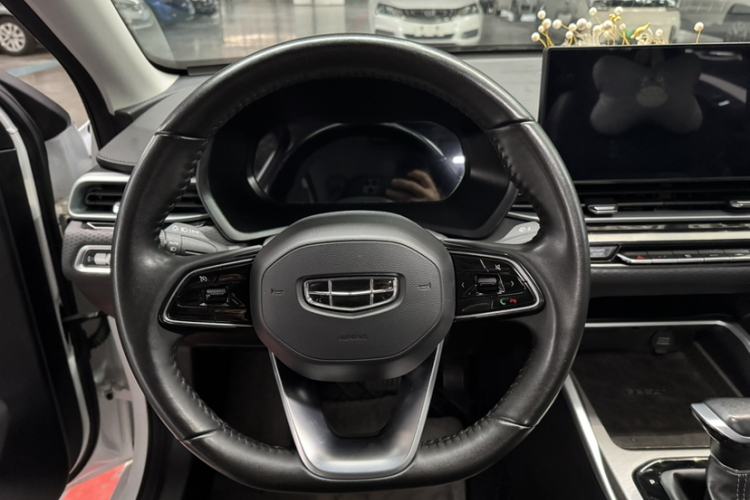 吉利汽车 帝豪 2023款 第4代冠军版 1.5L CVT尊贵型中控内饰7003