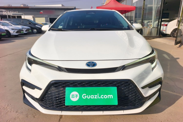 丰田 雷凌 2023款 智能电混双擎 1.8L 运动版车身外观2