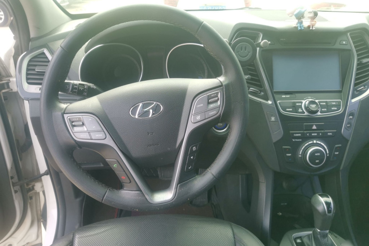 现代 胜达 2015款 2.4L 自动两驱智能型 5座中控内饰13