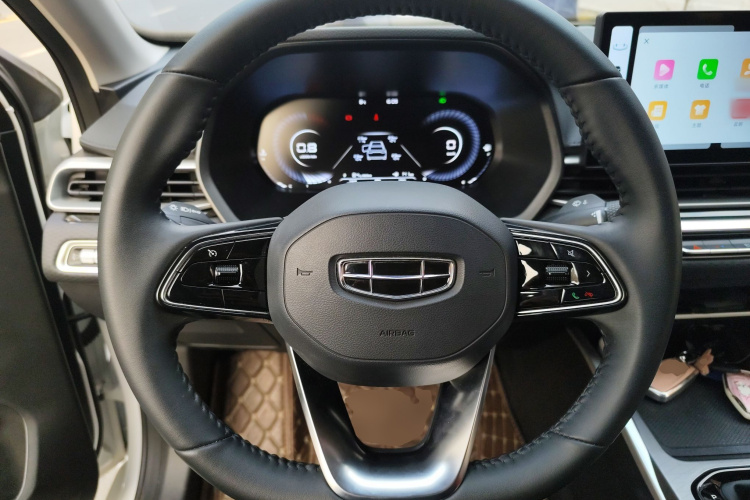 吉利汽车 帝豪 2023款 第4代冠军版 1.5L CVT尊贵型中控内饰13