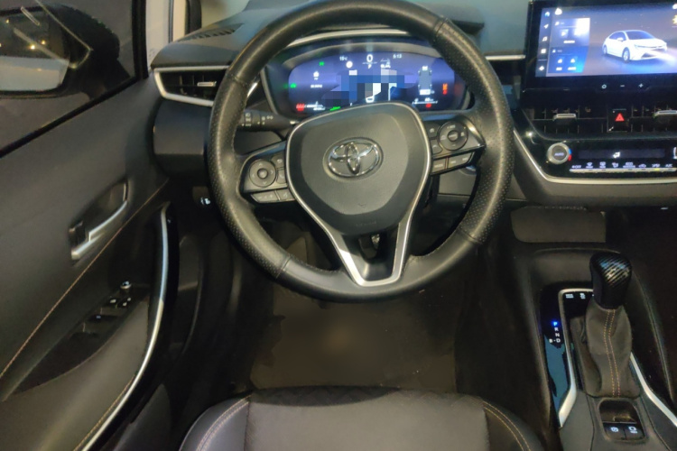 丰田 雷凌 2023款 智能电混双擎 1.8L 运动版中控内饰13