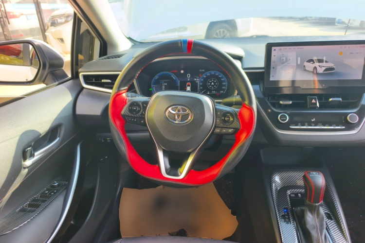 丰田 雷凌 2023款 智能电混双擎 1.8L 运动版中控内饰13