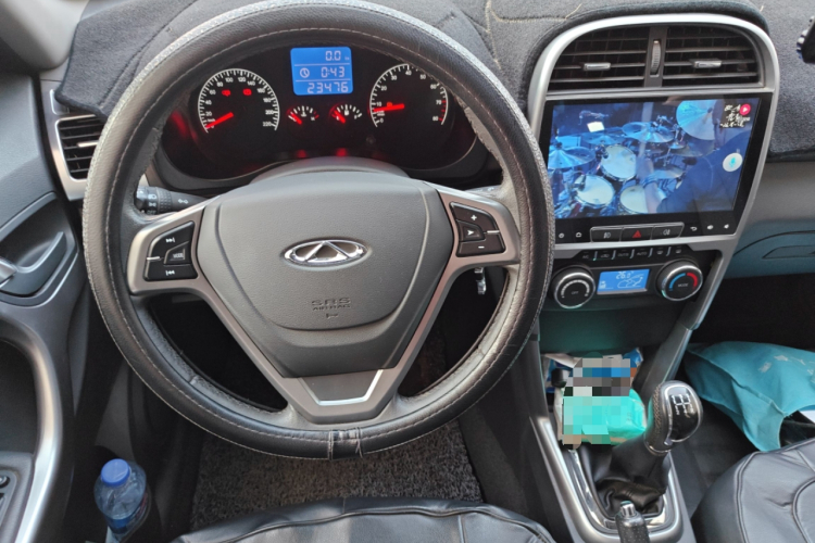 奇瑞 瑞虎3 2015款 1.6L 手动智尚纪念版中控内饰13