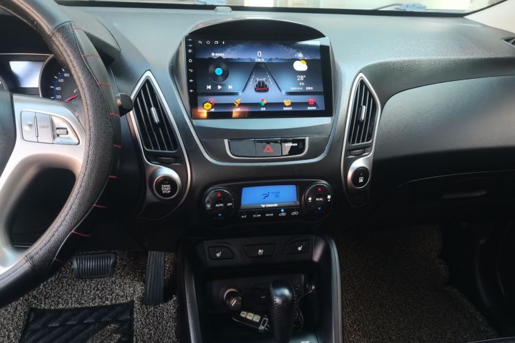 北京现代ix35 2012款 2.0L 自动两驱精英版GLS中控内饰16