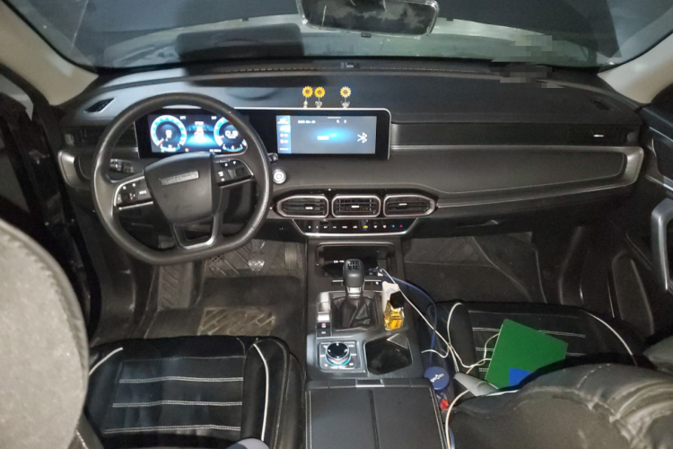 捷途X70 PLUS 2021款 改款 1.5T 手动风 7座中控内饰12