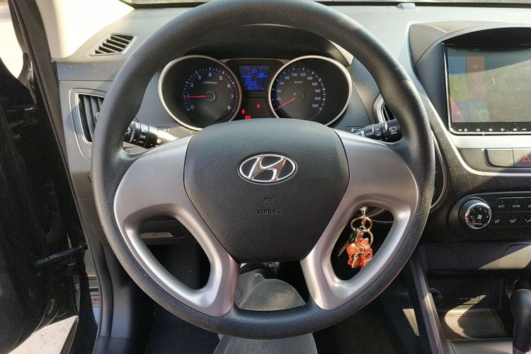 北京现代ix35 2015款 2.0L 自动两驱舒适型 国V中控内饰13