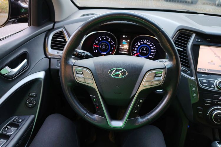 现代 胜达 2015款 2.4L 自动两驱智能型 5座中控内饰13